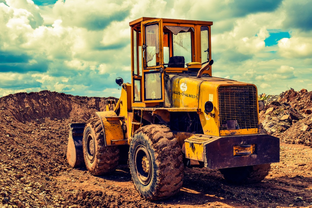 https://www.rakresourcesgroup.com/wp-content/uploads/2020/07/bulldozer-clouds-dirty-equipment-416965-1.jpg